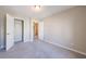 Bedroom with neutral walls, carpeted floor, closet, and natural light at 2873 Snapfinger Mnr, Decatur, GA 30035