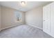 Bedroom featuring neutral walls and carpeted floors, with a window offering natural light at 2873 Snapfinger Mnr, Decatur, GA 30035