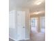 Upstairs hallway showcasing natural light, neutral paint, and access to several rooms at 2873 Snapfinger Mnr, Decatur, GA 30035