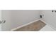 Tiled laundry room features neutral walls and tiled floors at 2873 Snapfinger Mnr, Decatur, GA 30035