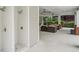 Modern outdoor shower with seating area featuring ceiling fans at 11302 Musette Cir, Alpharetta, GA 30009