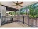 This covered patio provides shade and a place to relax at 11302 Musette Cir, Alpharetta, GA 30009