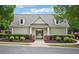 Charming community pool house surrounded by lush landscaping at 11302 Musette Cir, Alpharetta, GA 30009