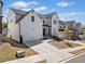 Beautiful two-story home featuring an attached two-car garage and a well-maintained front lawn at 117 Villanueva Rd, Woodstock, GA 30188