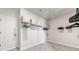 Walk-in closet with ample storage space, organized shelving, and neutral carpeting at 117 Villanueva Rd, Woodstock, GA 30188
