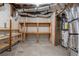 Spacious unfinished basement area, perfect for storage or future customization, with shelving at 2311 Sims Ne Dr, Marietta, GA 30066