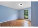 Bright and airy bedroom with hardwood floors and a large window with outdoor views at 2311 Sims Ne Dr, Marietta, GA 30066
