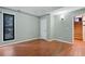 Cozy bedroom with wood floors offers a tranquil retreat with access to other areas of the home at 2311 Sims Ne Dr, Marietta, GA 30066