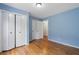 Comfortable bedroom with hardwood floors, natural light and closet at 2311 Sims Ne Dr, Marietta, GA 30066