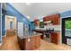 Well-appointed kitchen featuring wood cabinets, granite countertops, and stainless steel appliances at 2311 Sims Ne Dr, Marietta, GA 30066