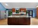 Large kitchen island with stainless steel appliances and a view of the backyard at 2311 Sims Ne Dr, Marietta, GA 30066