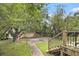 Spacious backyard featuring a deck and views of the surrounding greenery at 2785 Toney Dr, Decatur, GA 30032