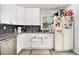 Well-maintained kitchen with white cabinets, granite countertops, and stainless steel dishwasher at 2785 Toney Dr, Decatur, GA 30032