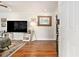 Bright and spacious living room featuring hardwood floors, area rug, and ample natural light at 2785 Toney Dr, Decatur, GA 30032