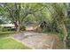 Overgrown backyard with an old shed, providing potential for renovation or additional storage at 2785 Toney Dr, Decatur, GA 30032