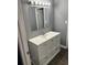 Bathroom showing a white vanity with cabinets and drawers at 3575 Oakvale Rd # 305, Decatur, GA 30034