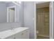 Bright bathroom featuring a white vanity and a shower-tub combination at 3575 Oakvale Rd # 305, Decatur, GA 30034