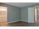 Bedroom showing an ensuite bathroom and neutral wall paint at 3575 Oakvale Rd # 305, Decatur, GA 30034