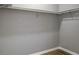 Walk-in closet with shelving racks and white trim baseboards at 3575 Oakvale Rd # 305, Decatur, GA 30034