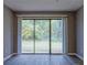 Living room featuring sliding glass doors that lead to the outdoors at 3575 Oakvale Rd # 305, Decatur, GA 30034