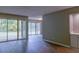 Living room showing large sliding glass doors and hard surface flooring at 3575 Oakvale Rd # 305, Decatur, GA 30034