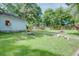 Manicured backyard with fence and mature trees at 4236 Florida Nw Ave, Atlanta, GA 30360