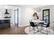 Dining room view with kitchen access, round table and chandelier at 1251 Pierce Ave, Smyrna, GA 30080