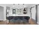 Stylish kitchen with large island, stainless steel appliances, white countertops, and pendant lighting at 1251 Pierce Ave, Smyrna, GA 30080