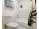 Modern bathroom featuring a clean design with a shower-tub combo and sleek finishes at 361 Adelle Se St, Atlanta, GA 30315