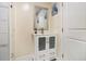 Elegant bathroom with a modern vanity, stylish mirror, and tiled shower at 361 Adelle Se St, Atlanta, GA 30315