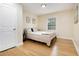 Cozy bedroom with hardwood floors, neutral decor, and a serene atmosphere at 361 Adelle Se St, Atlanta, GA 30315