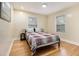 Bright bedroom with hardwood floors, natural light, and a comfortable bed at 361 Adelle Se St, Atlanta, GA 30315