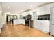 Spacious, updated kitchen with white cabinets, stainless appliances, and hardwood floors at 361 Adelle Se St, Atlanta, GA 30315