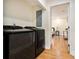 Convenient laundry area with modern washer and dryer units next to the main bedroom at 361 Adelle Se St, Atlanta, GA 30315