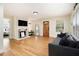 Inviting living room with a light filled space, hardwood floors, and modern decor at 361 Adelle Se St, Atlanta, GA 30315