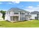 The backyard features a lush lawn and a patio area perfect for outdoor entertaining at 4105 Vista Pointe Dr, Cumming, GA 30028