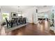 Stylish dining room with a large table and seamless access to the kitchen at 4105 Vista Pointe Dr, Cumming, GA 30028