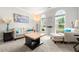 Bright and airy living room with neutral decor and large windows at 4105 Vista Pointe Dr, Cumming, GA 30028