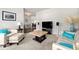 Comfortable living room with modern decor, plush seating, and entertainment center at 4105 Vista Pointe Dr, Cumming, GA 30028