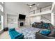 Bright living room with a stone fireplace, built-in shelves, and upper-level views at 4105 Vista Pointe Dr, Cumming, GA 30028