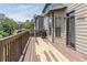 Private back deck undergoing refurbishment offers an ideal spot for outdoor dining or relaxation and backyard views at 2183 Trinity Grove Ct, Dacula, GA 30019