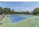 Community tennis courts for staying active with friends and neighbors on well-maintained and lighted courts at 2183 Trinity Grove Ct, Dacula, GA 30019