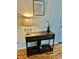 Stylish entryway featuring a wooden console table with decorative accents and a modern lamp at 1403 Dennis Dr, Decatur, GA 30032