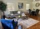 Cozy living room with modern furniture, hardwood floors, and a neutral color palette at 1403 Dennis Dr, Decatur, GA 30032