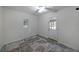 Bright room with marble tile, a door to the outside and natural light from a large window at 1403 Dennis Dr, Decatur, GA 30032