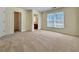 Large bedroom with neutral carpet, walk-in closet and window to allow natural light at 3533 Mulberry Way, Duluth, GA 30096