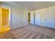 A large bedroom with carpet, three closets and an attached bathroom with shower at 3533 Mulberry Way, Duluth, GA 30096
