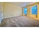Bright, carpeted bedroom with two windows offering exterior views at 3533 Mulberry Way, Duluth, GA 30096