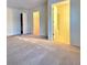 A bedroom with carpet, featuring access to a walk-in closet and ensuite bathroom at 3533 Mulberry Way, Duluth, GA 30096
