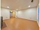 Spacious living area with wood-look floors, fireplace, and multiple windows for natural light at 3533 Mulberry Way, Duluth, GA 30096